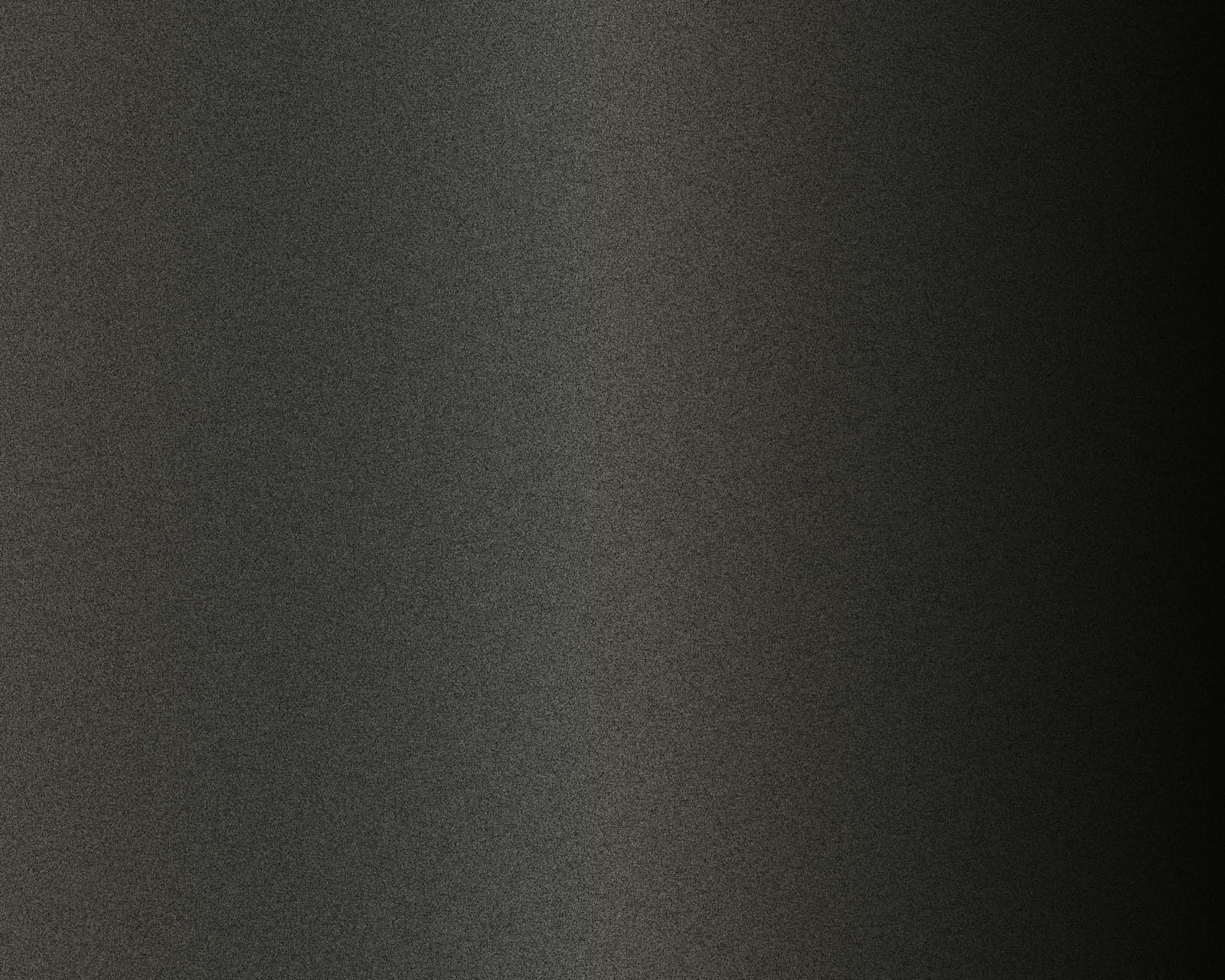 Close-up of a graphite-toned metallic wall covering