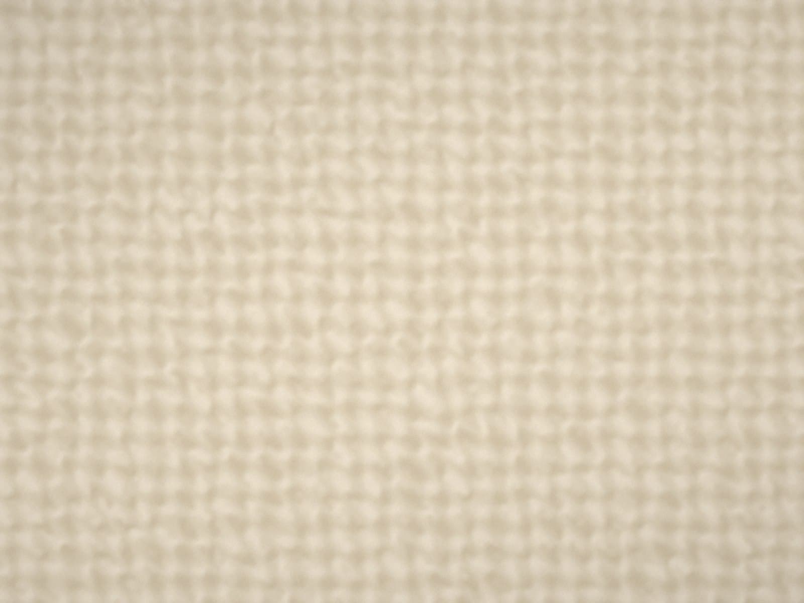 Close-up of a woven upholstery fabric in oat