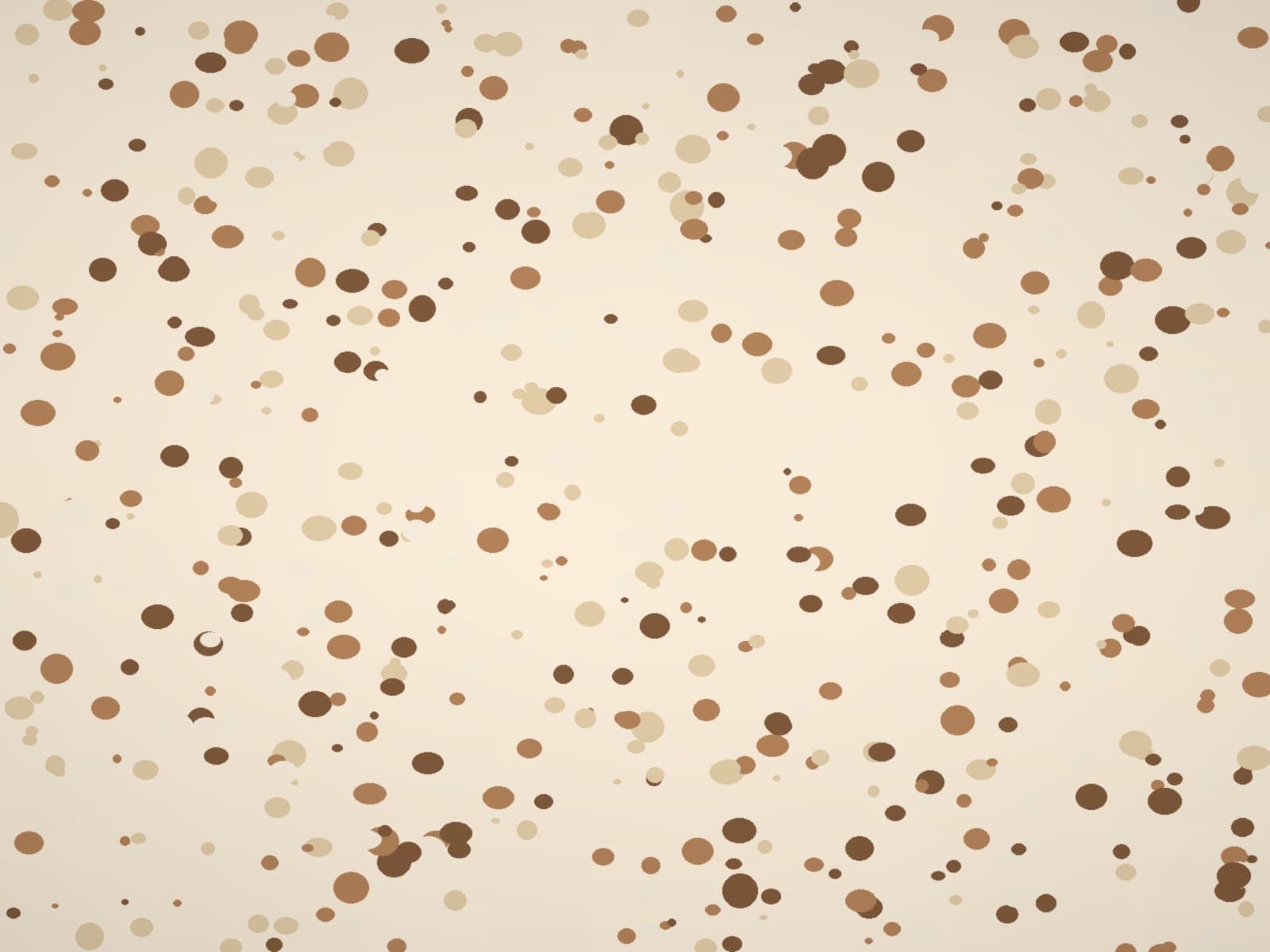 Close-up of a warm-toned terrazzo-effect luxury vinyl tile