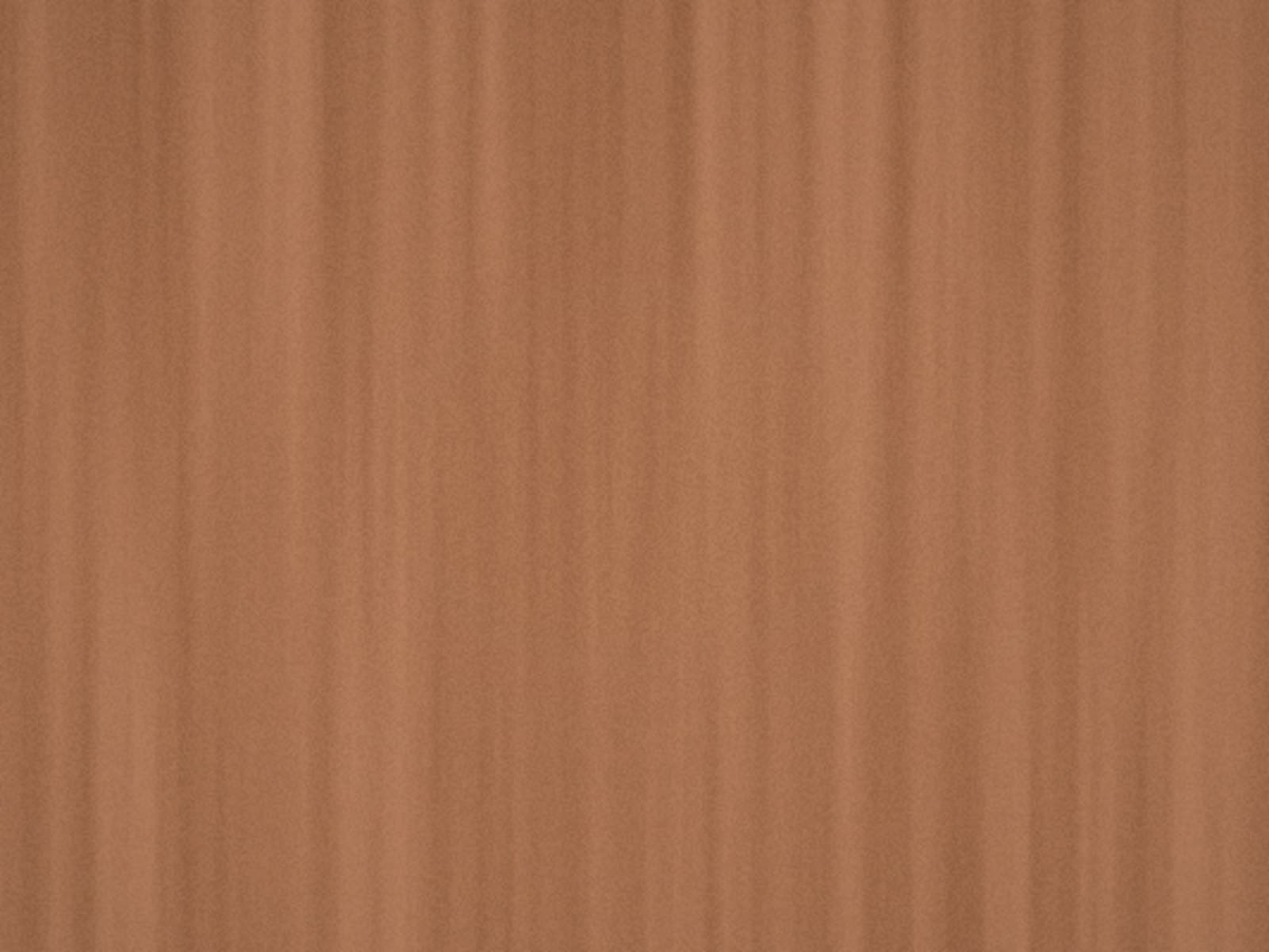 Close-up of a burnt clay coloured textured wall covering