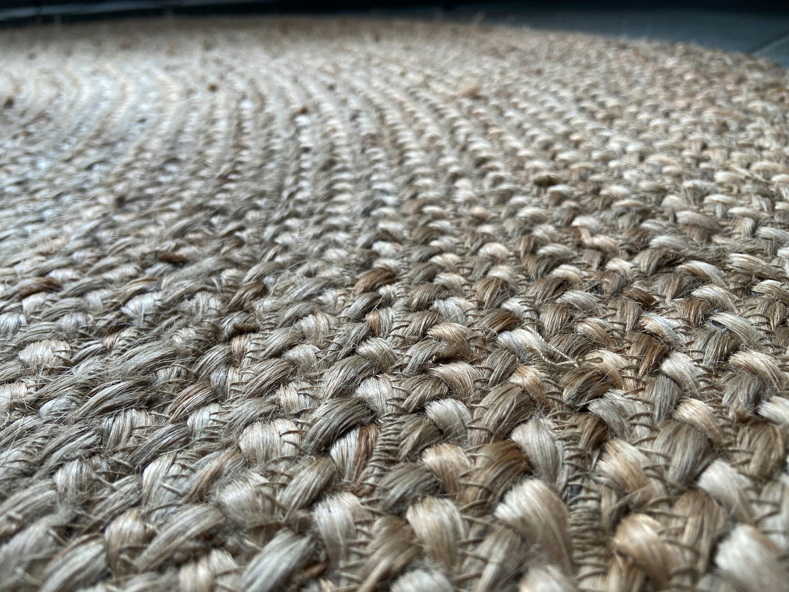 Close-up of a woven natural-fibre wall covering texture