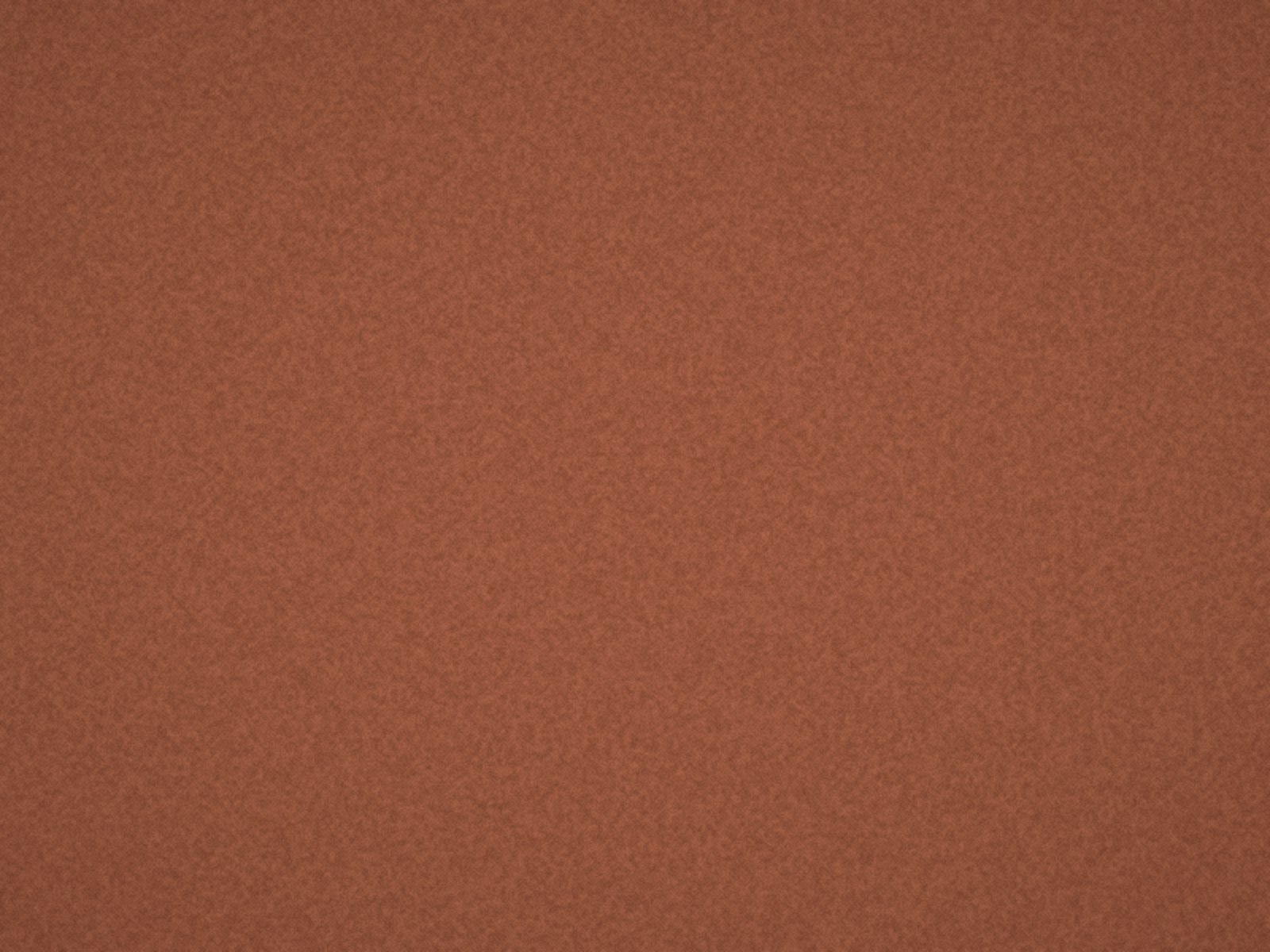 Close-up of a contract carpet tile in rust